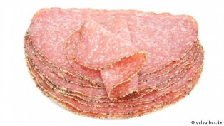 Several slices of salami in a stack